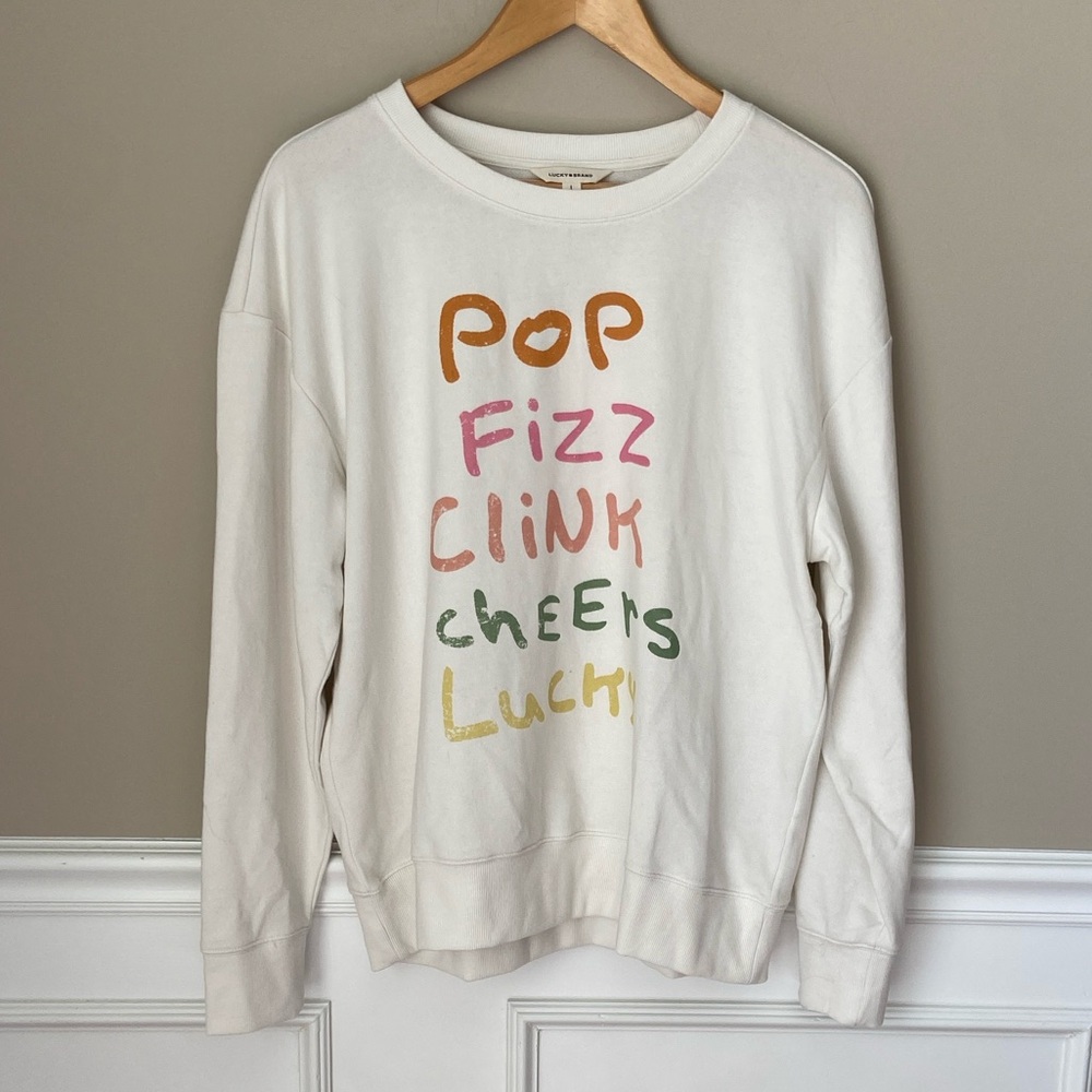 Lucky Brand Cream Graphic Pullover Top Large NWT‎ Party Celebrate New Years Eve